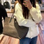 COACH CITY SIGNATURE