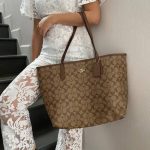 COACH CITY SIGNATURE