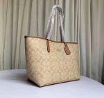 COACH CITY SIGNATURE