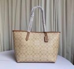 COACH CITY SIGNATURE